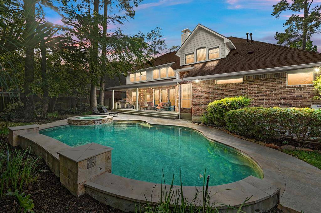 Welcome to 126 E Mirror Ridge Circle in the heart of The Woodlands!