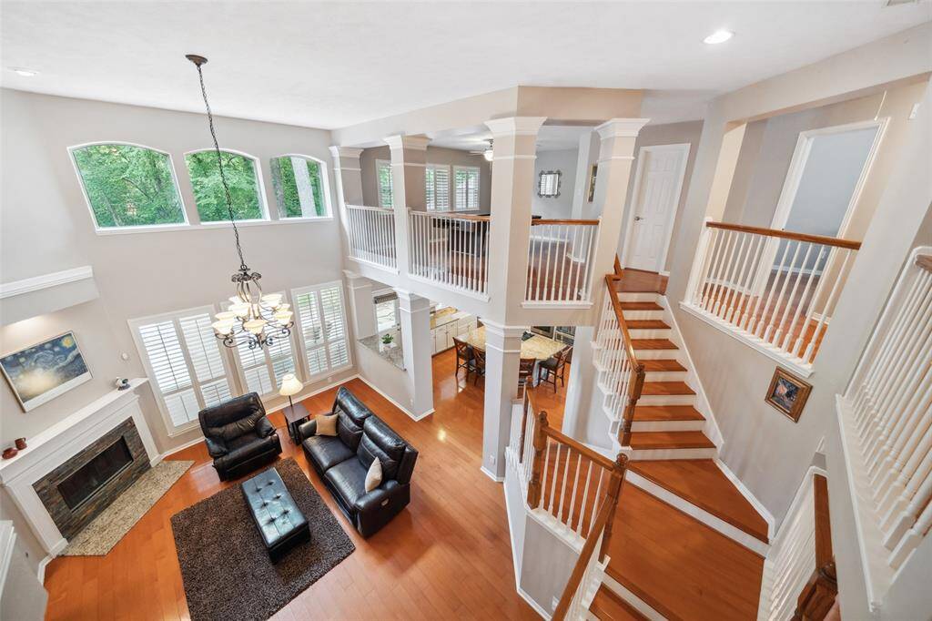 This stately home has fresh neutral paint and continuous wood flooring throughout.