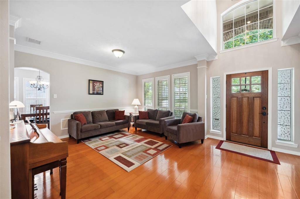 Formal living leads to dining room and family room.