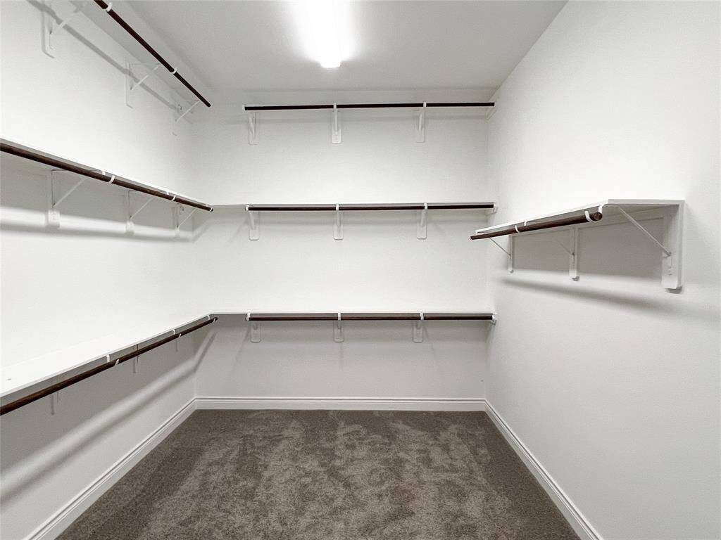 Countless space in this walking closet in the primary room.