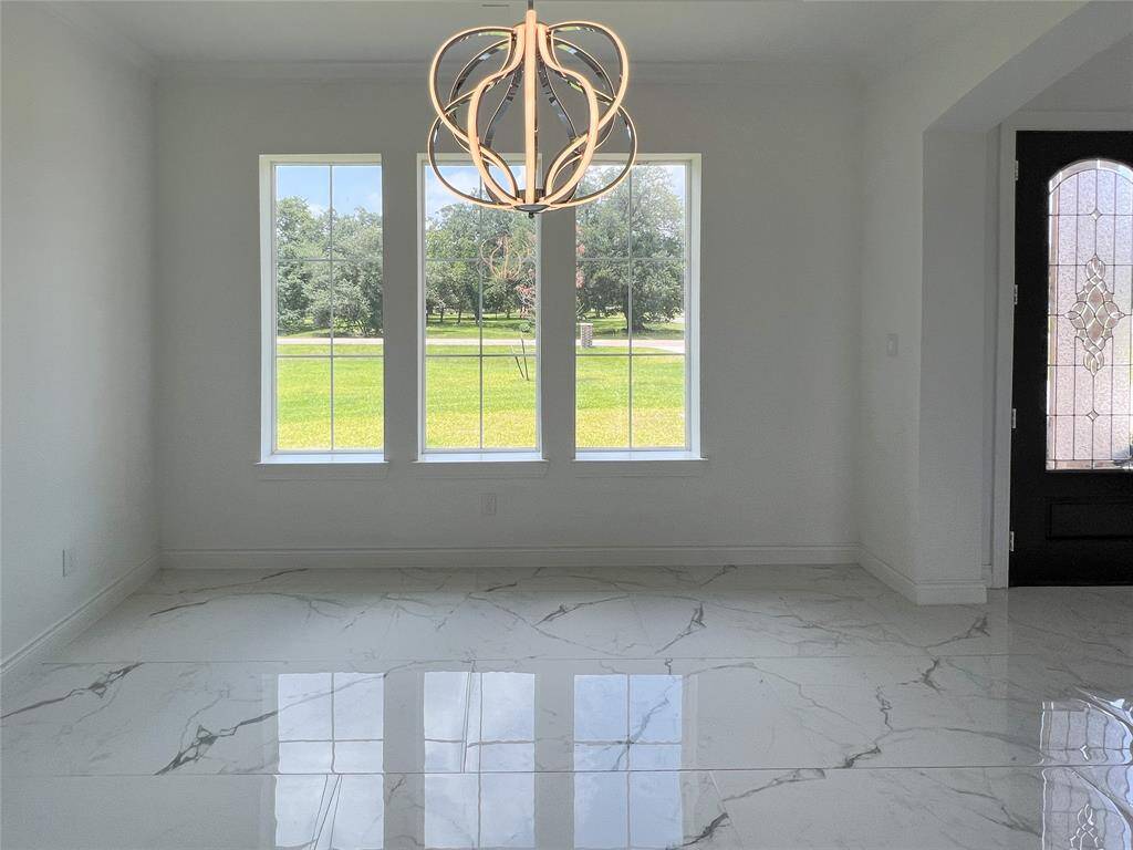 A different view to this dining area as you enter your future home.