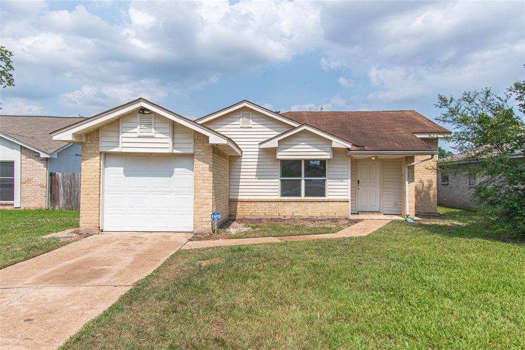 Charming single-story home with a classic design, featuring a one-car garage and a welcoming front yard. The exterior combines brick and siding, offering a cozy and inviting appearance. Perfect for first-time buyers or those seeking a comfortable living space.