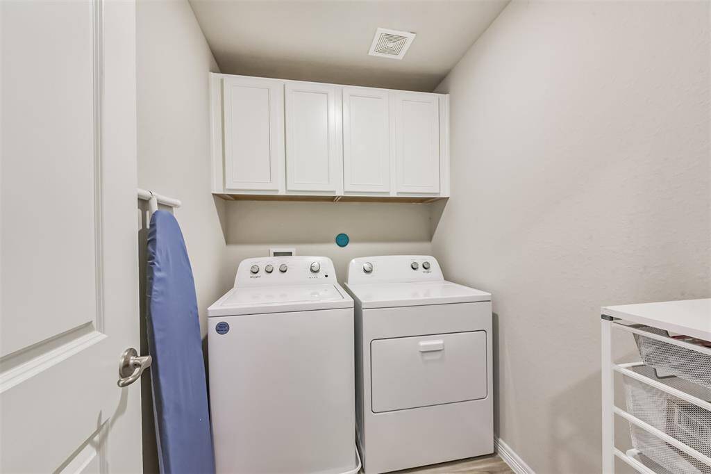Laundry room conveniently located on second floor