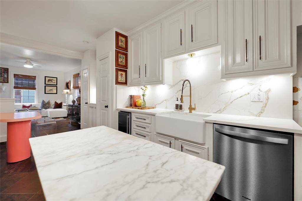 Newly painted cabinets and added storage throughout the kitchen makes it easy for entertaining!