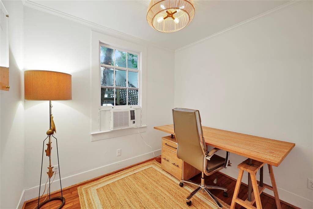 Additional room in the carriage house that could be a bedroom or office space for guests
