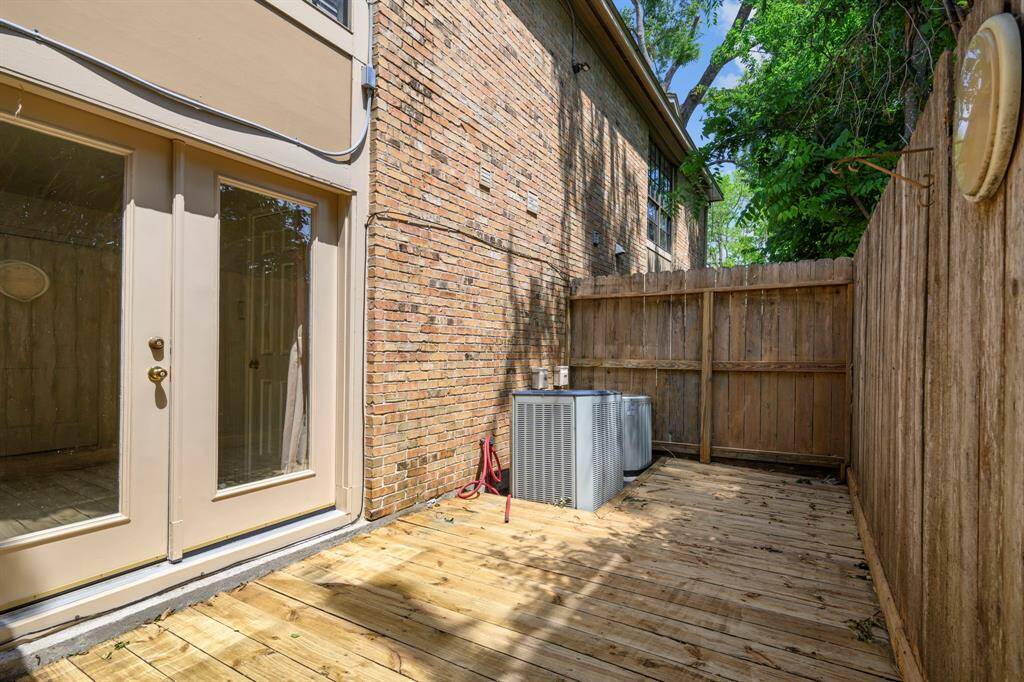 Patio outside of the primary bedroom. (View in opposite direction).