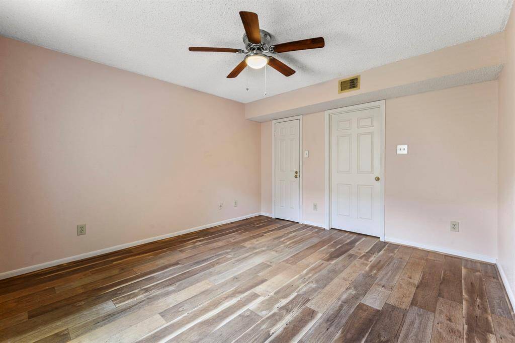 13x12 Bedroom - Walk-in closet is located behind door on the left.