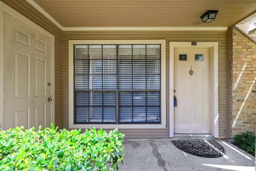 Private entry area with locked storage to the left on the porch.