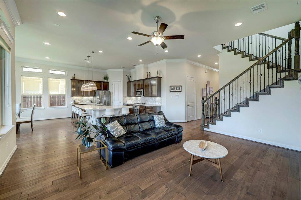 The family room provides a comfortable and inviting space for your cherished friends to relax and enjoy engaging conversations. Its open layout lends itself perfectly to hosting gatherings and parties, creating an ideal setting for creating lasting memories.