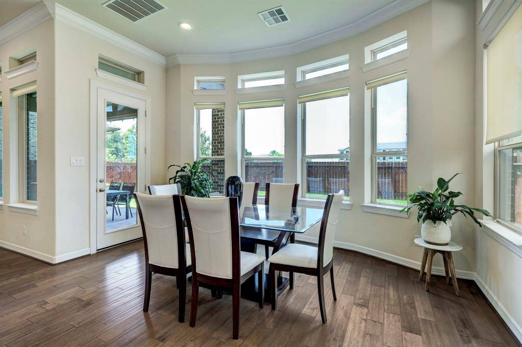 The formal dining room provides convenient access to the veranda and backyard.