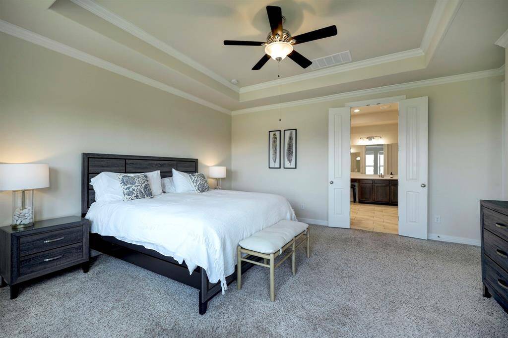 Primary bedroom also has access to its own private bath for added convenience and privacy.