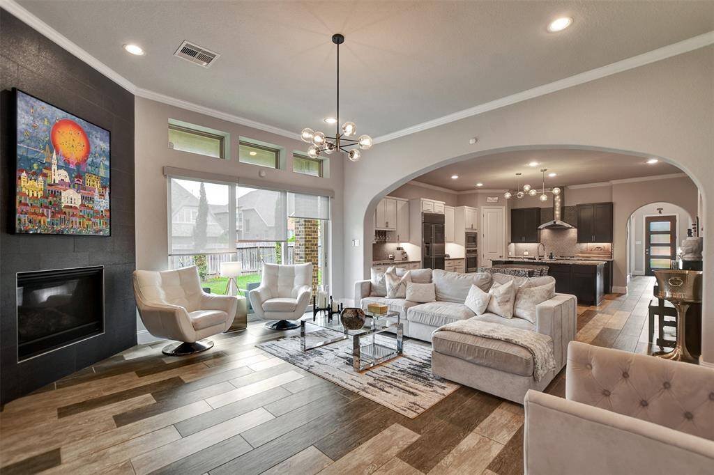 Sliding doors provide abundant natural light and a view of the backyard