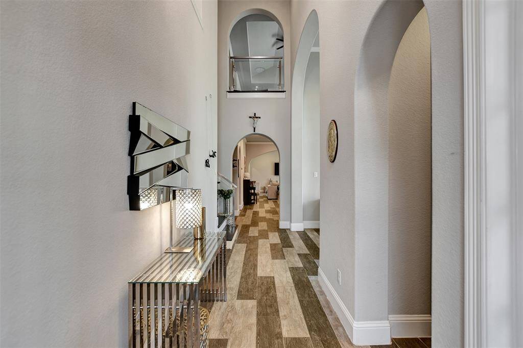 Beautiful floors lead the way to this home.