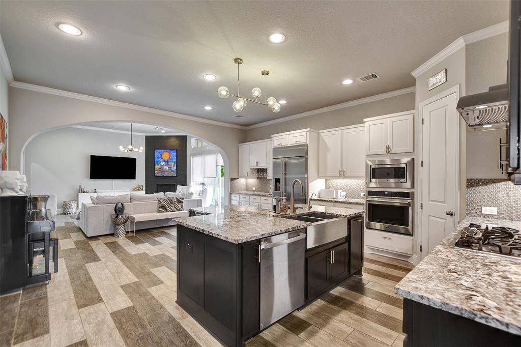 Welcome to your dream kitchen, with an open floor plan you can enjoy cooking, entertaining or just relaxing in this inviting living room.