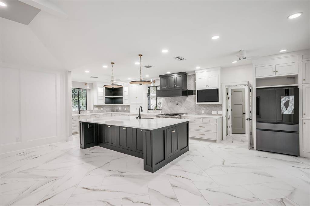 New LED recessed lighting illuminates the kitchen.