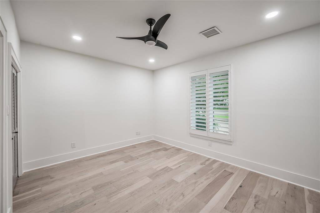 2 secondary bedrooms feature wood plank flooring – no carpeting in this home!