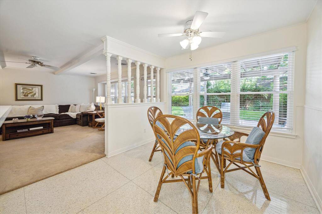 This primary bedroom, conveniently located downstairs, offers a retreat of tranquility and comfort. Two spacious walk-in closets, providing ample storage space for clothing and accessories, ensuring organization and ease in everyday living.