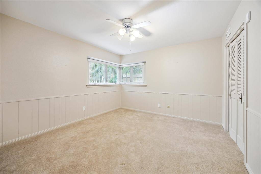 The downstairs half bath is thoughtfully tucked away from the main entertaining areas, providing the utmost privacy for guests and residents alike.