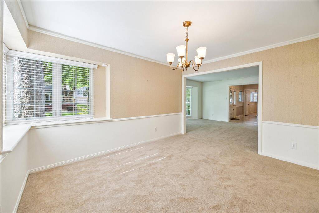 Formal Dining Room allows direct access to the Kitchen for ease of entertaining.