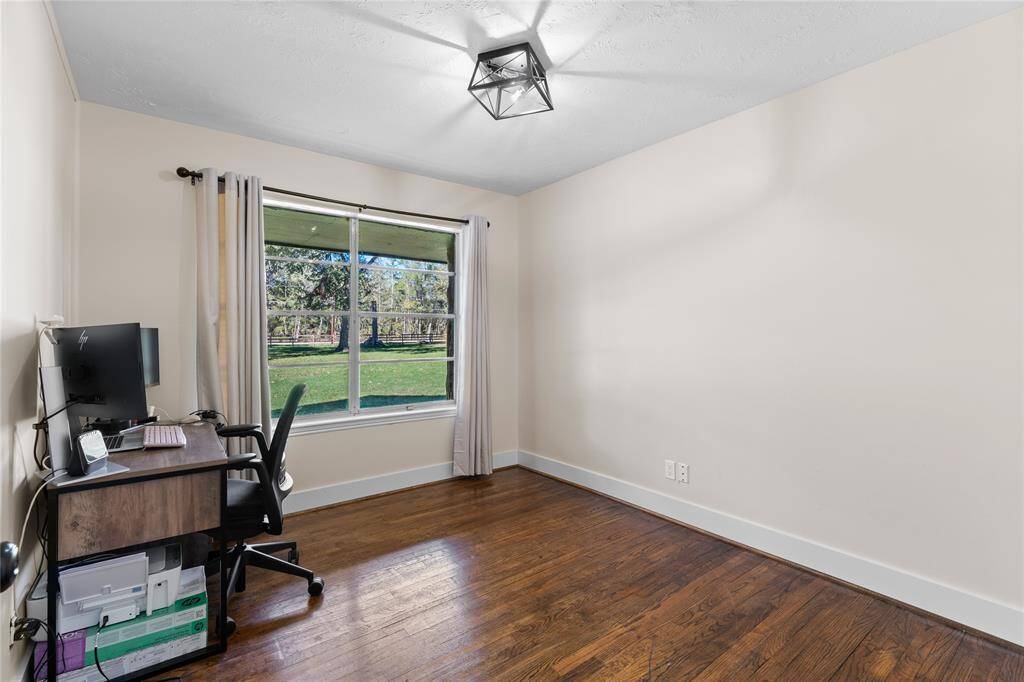 Versatile flex space with ample natural light — work from home with a view.