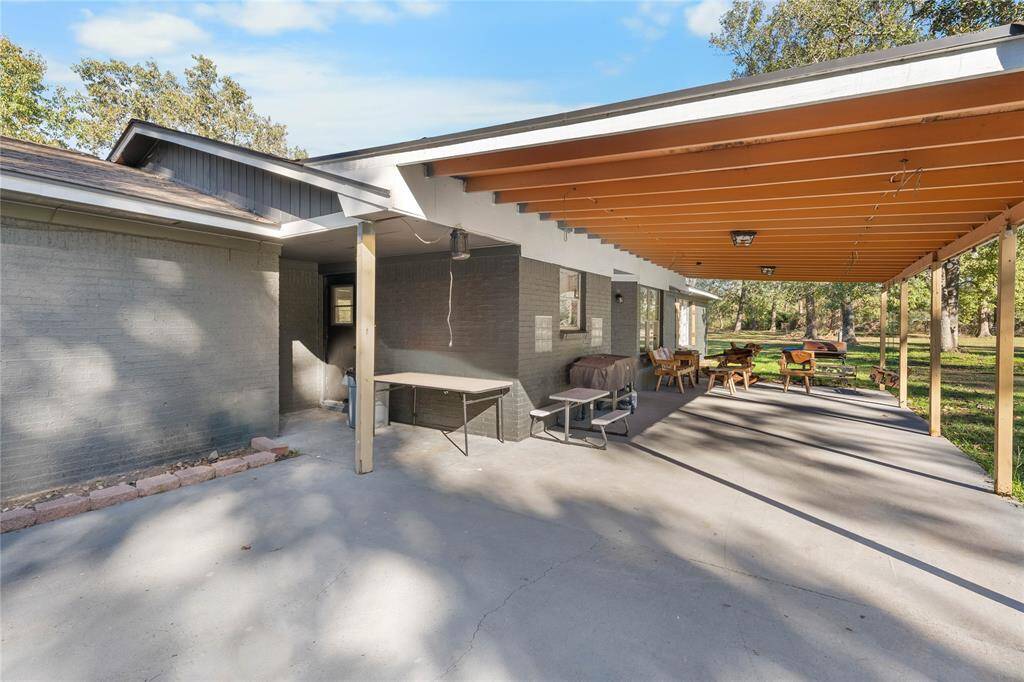 Unwind on the spacious back patio — a perfect morning coffee or evening stargazing spot.