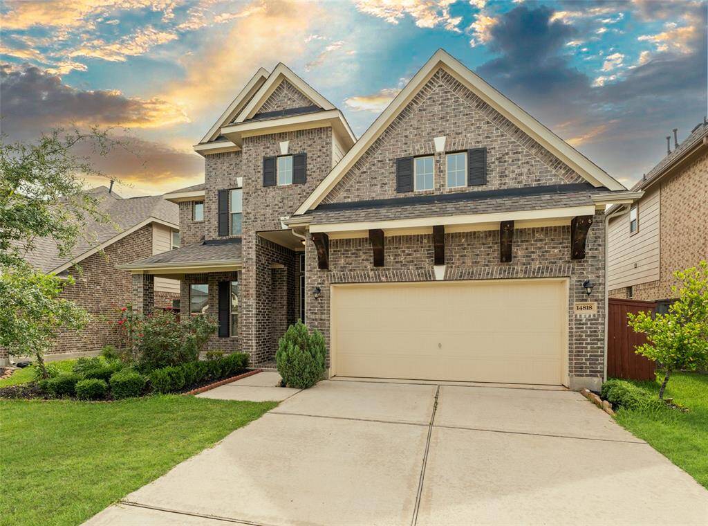 This home welcomes you with a huge driveway and beautiful curb appeal that immediately catches the eye.