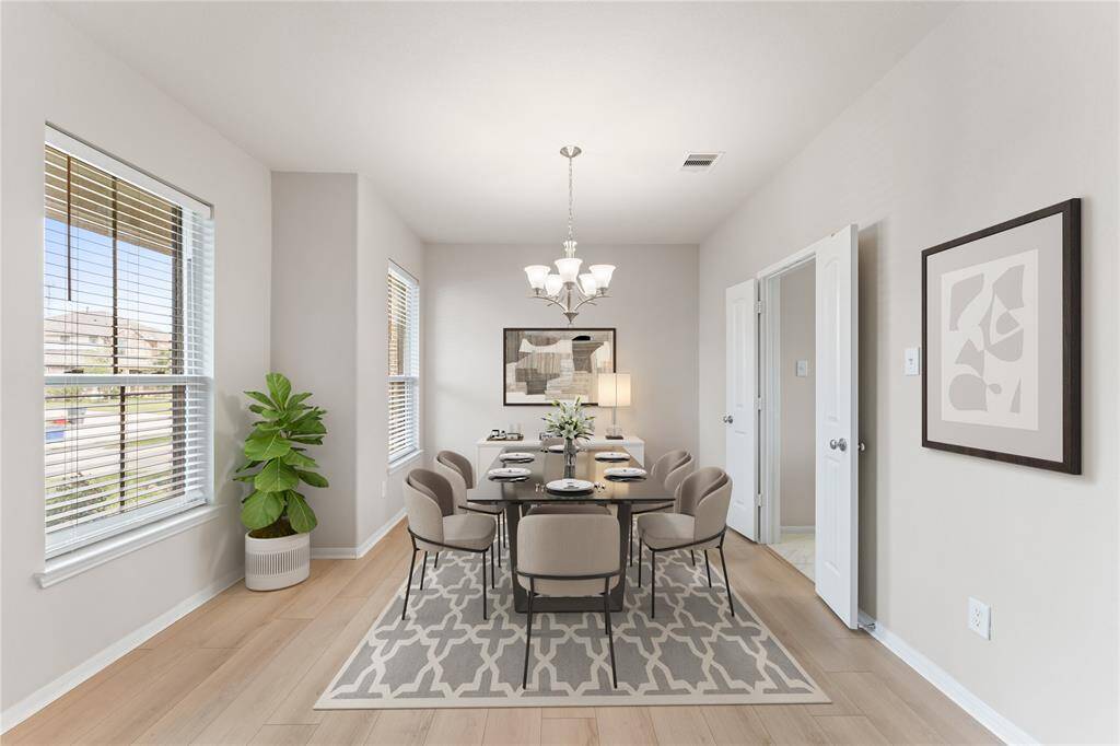 The dining area is expansive and full of light, making it ideal for family dinners or festive gatherings.