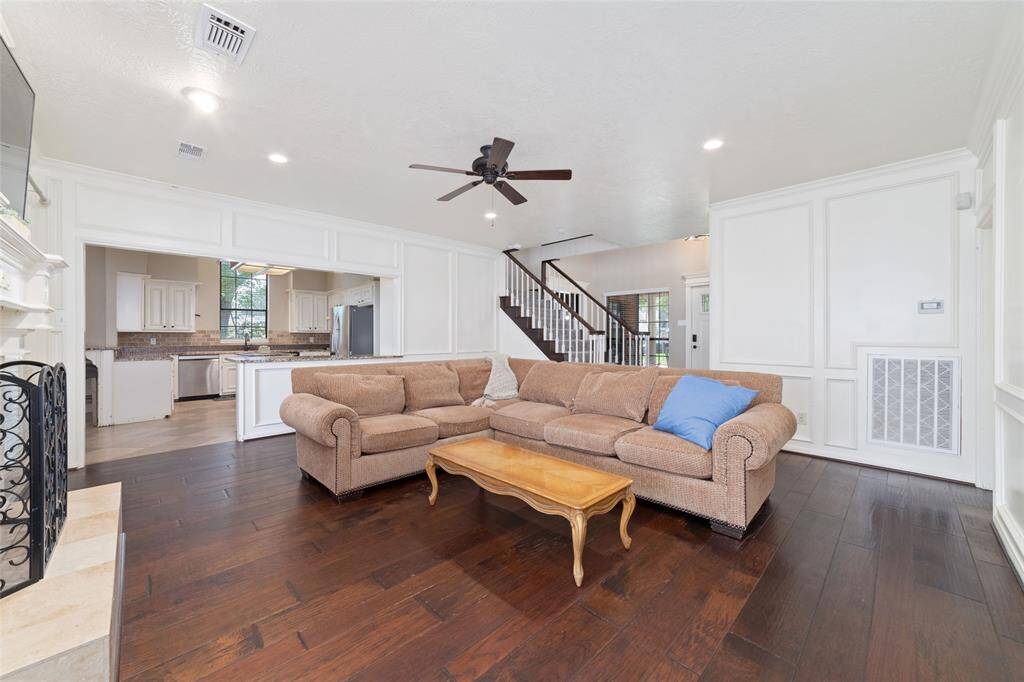 main family room opens up to kitchen and breakfast room