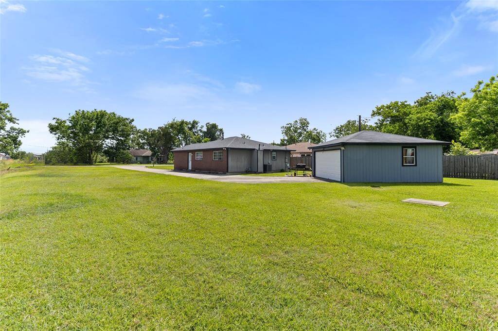 The detached 2-car garage features brand new siding, fresh trim & a recent exterior paint job—making it the perfect space for storage, a workshop, or your next creative project.