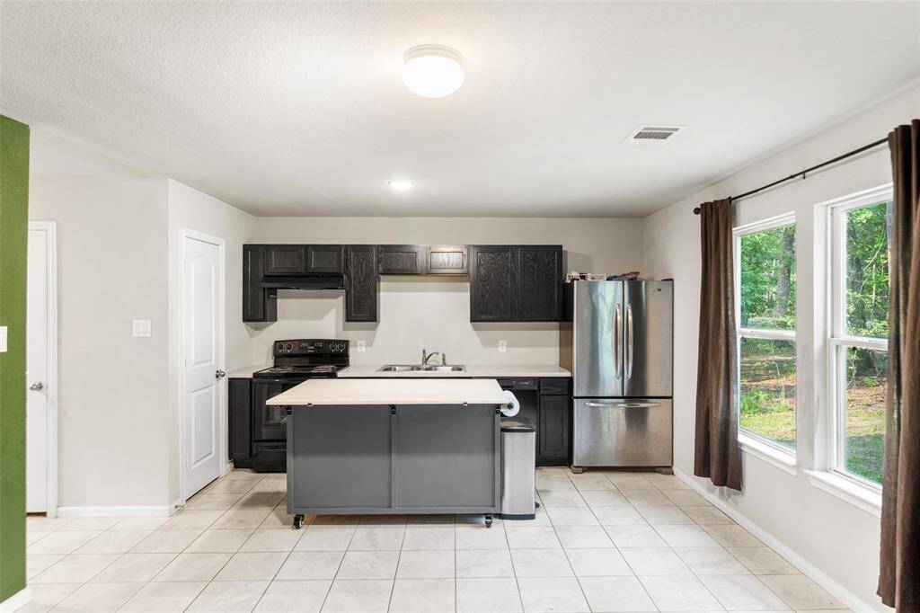 Refrigerator conveys with home as well.