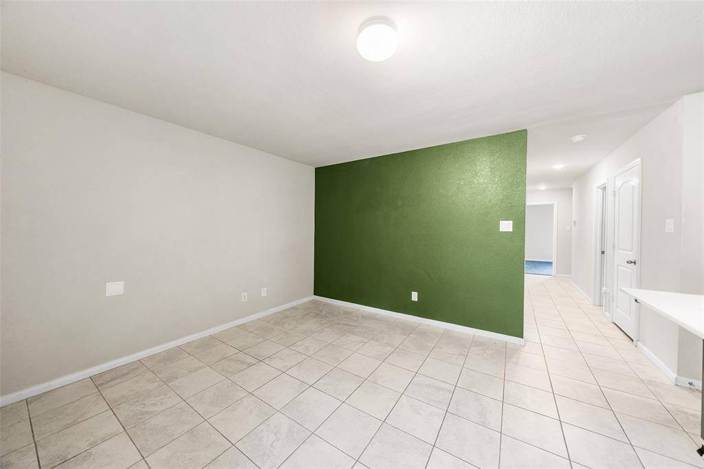 Living room with tile throughout.