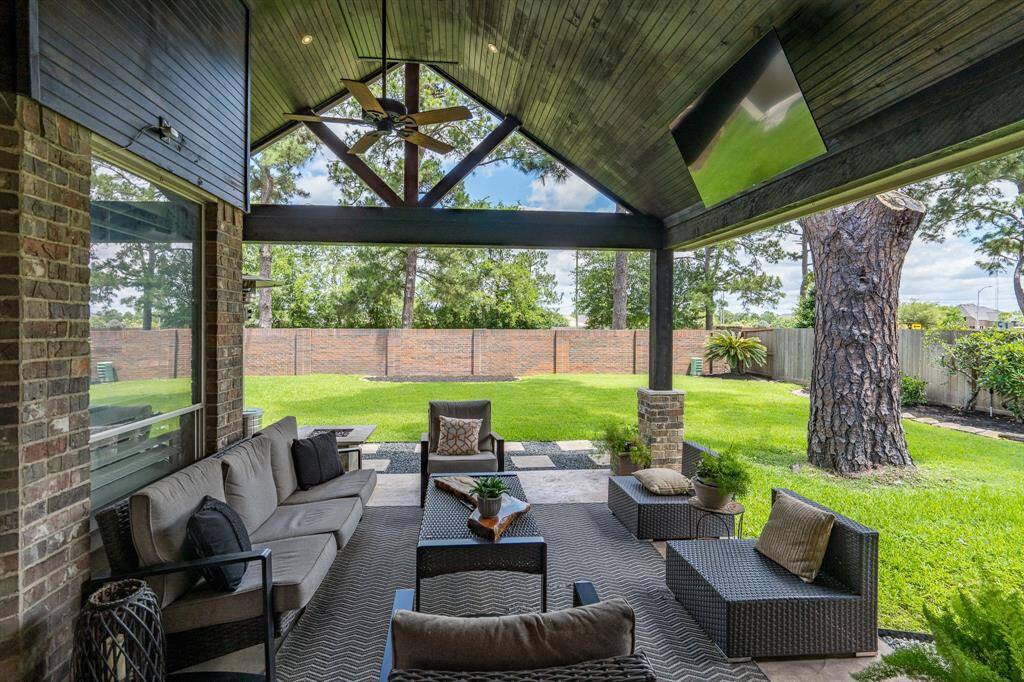 Just look at this tranquil backyard. The covered patio is sure to be a favorite spot for entertaining.