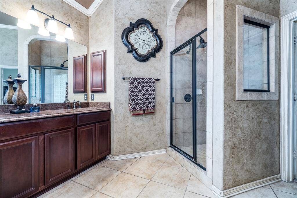 His side of the room also has the separate shower.
