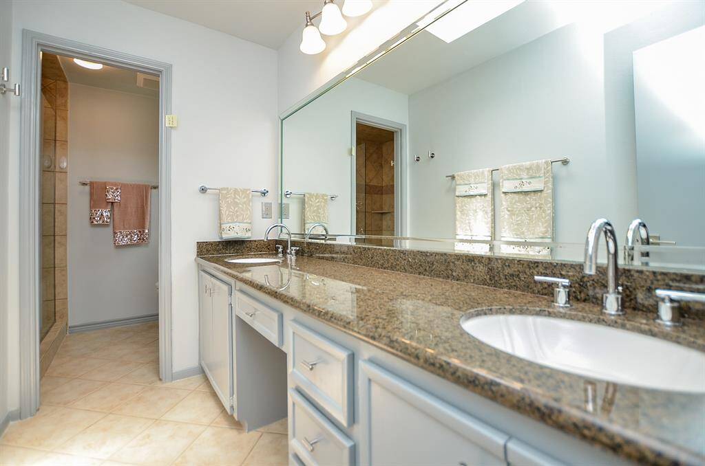 Separate sink and shower/toilet areas allow bathroom time to be more private.