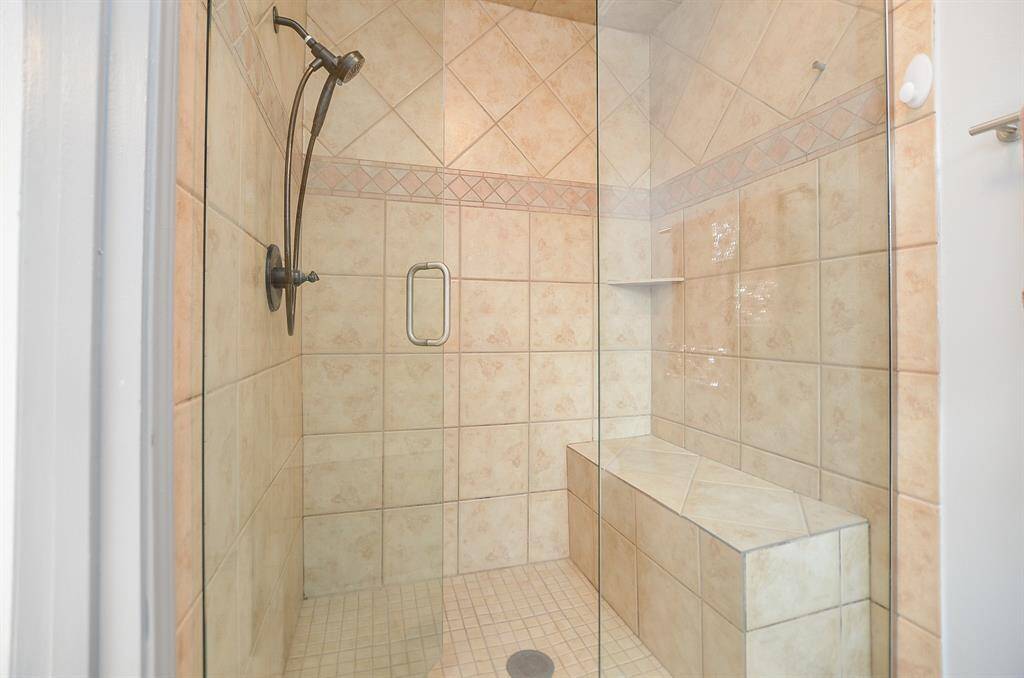 Bi-monthly cleaning service offered by the landlord keeps this shower squeaky clean.