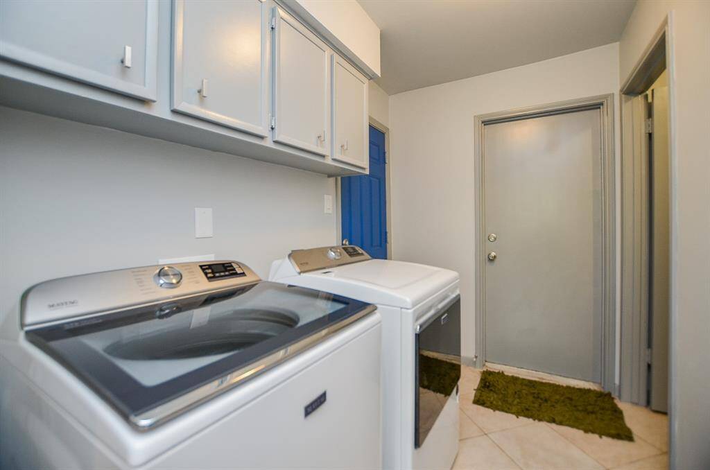 In-house Utility Room includes full sized washer and dryer.