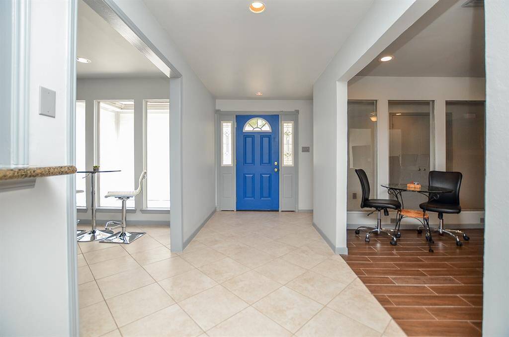 Easy upkeep tile floors throughout. Carpeting in the bedrooms.