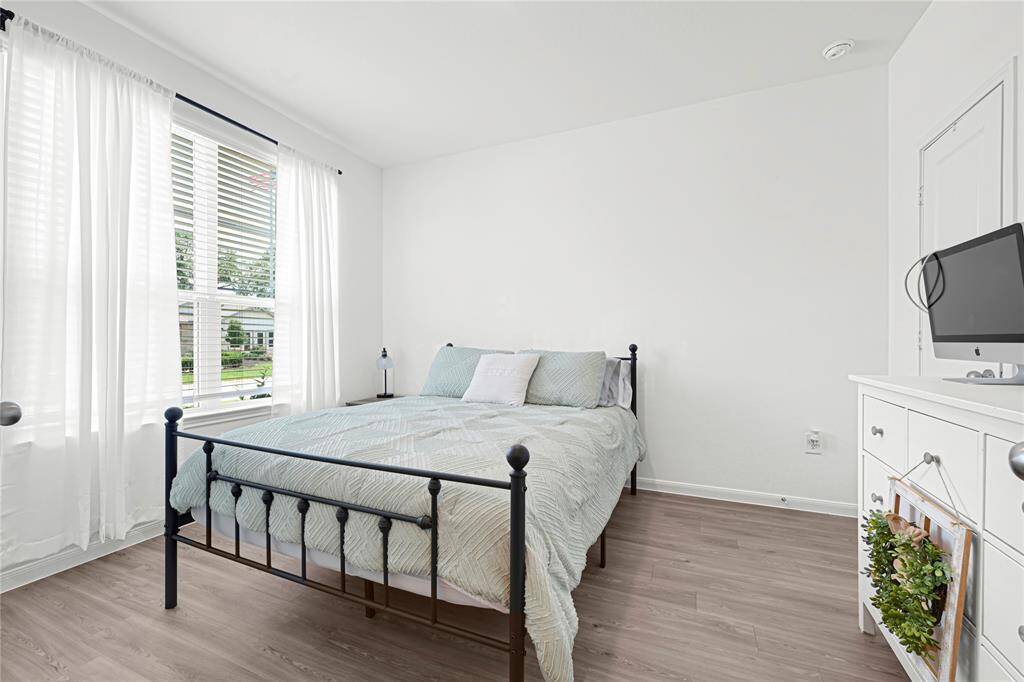 Dedicated study offers privacy and flexibility for work-from-home or creative space; can also be used, as pictured here, as an extra bedroom for family or guests.