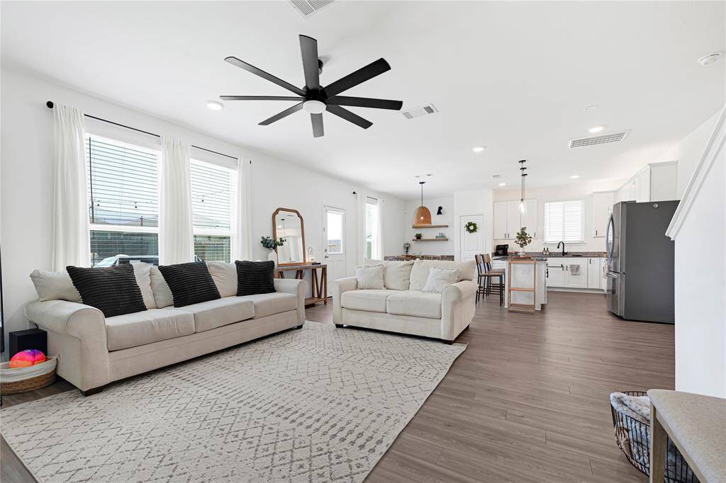 Bright and airy living space with abundant natural light and open-concept layout.