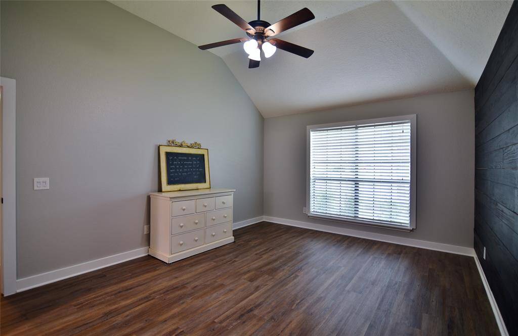 The customized wood wall provides a blank canvas for your new bed or your art work!