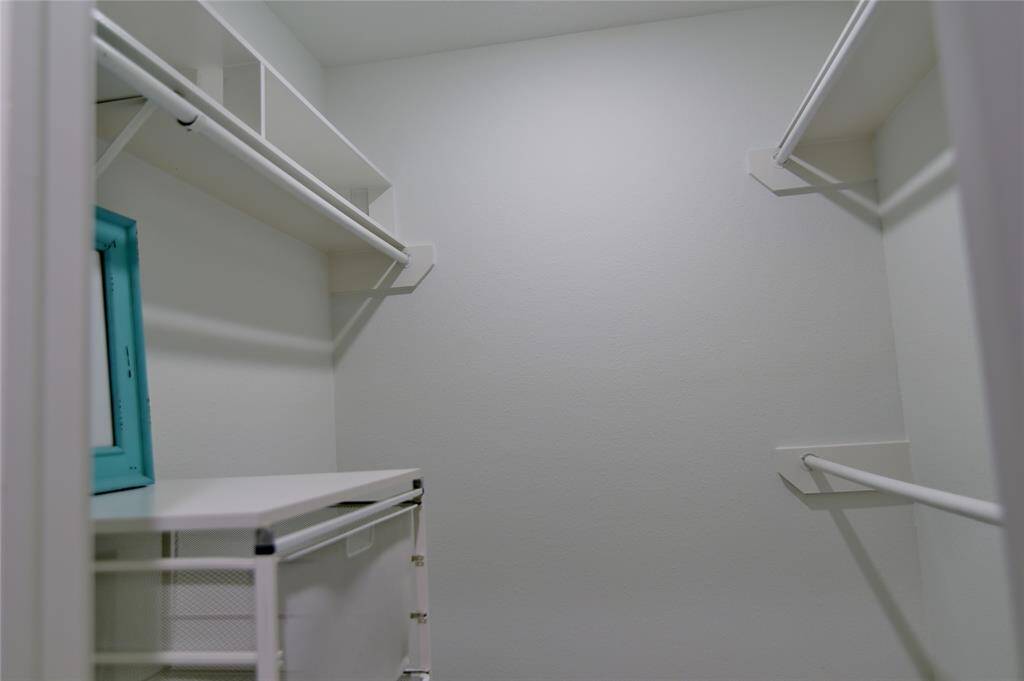 Walk-in closet in the primary bath....