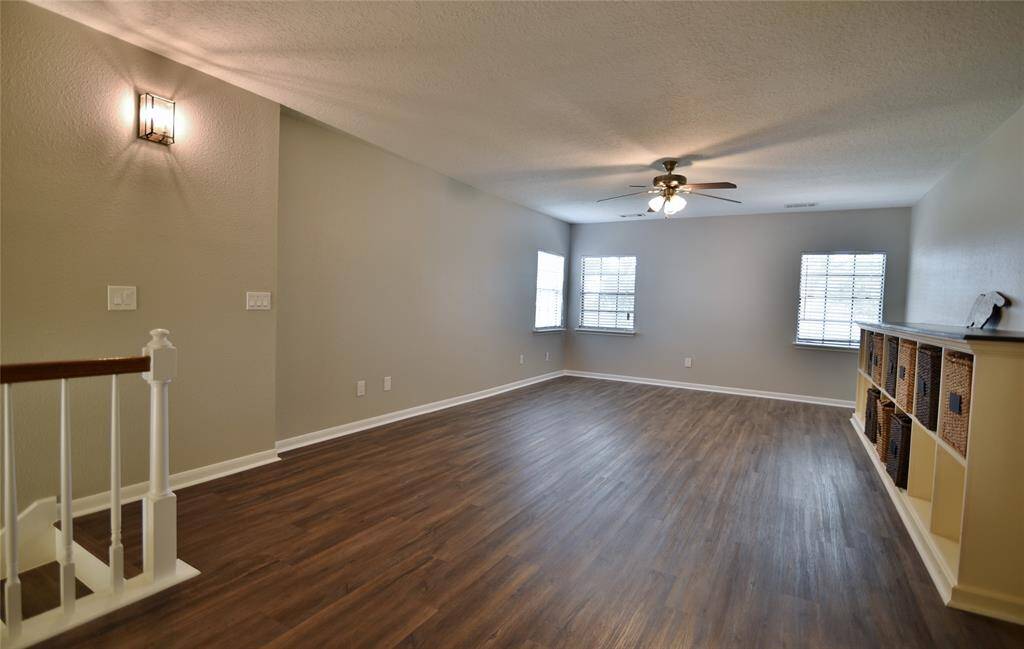 Coming up the stairs there is a landing area to your right with space for a game table or a computer station.....abundant room in this game or secondary gathering area for a large screen TV and sectional sofa...