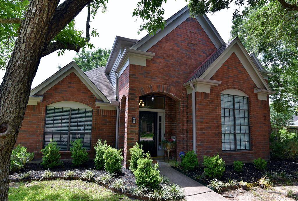 Stately bricked home with appealing architecture.....