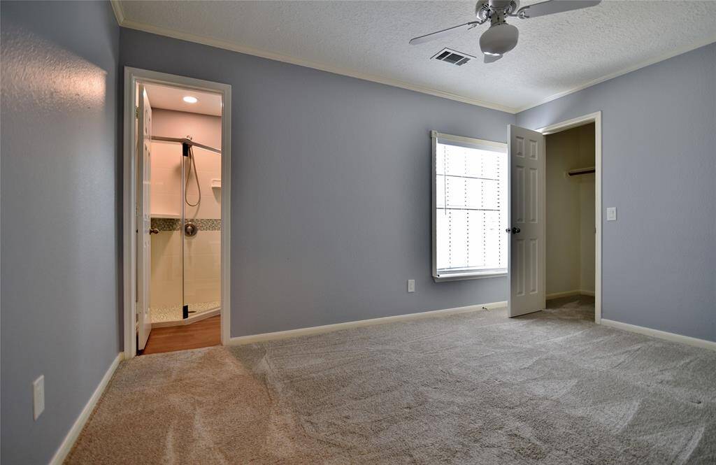 Bedroom upstairs with its own walk=in closet and private bath.....