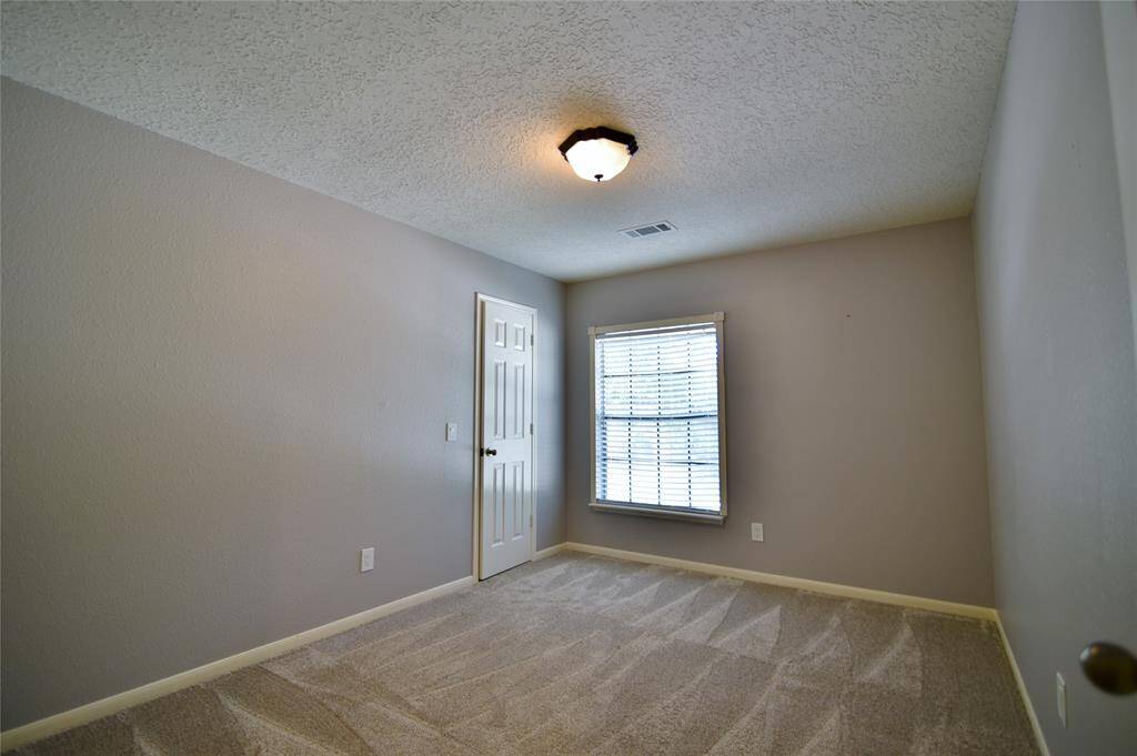 Bedroom 4 upstairs with walk-in closet....