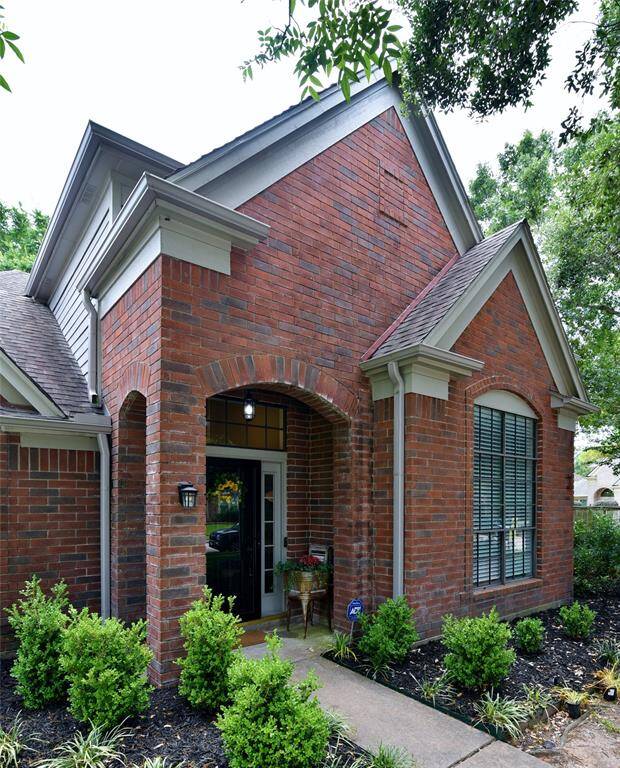 Recessed brick porch to 'frame' your entry into this lovely home....