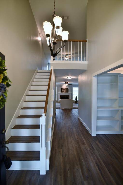 Entry foyer is two stories for that grand entry into the home.....straight ahead is the family room, and to the right is a flex room....Come on inside and look through your next dwelling....