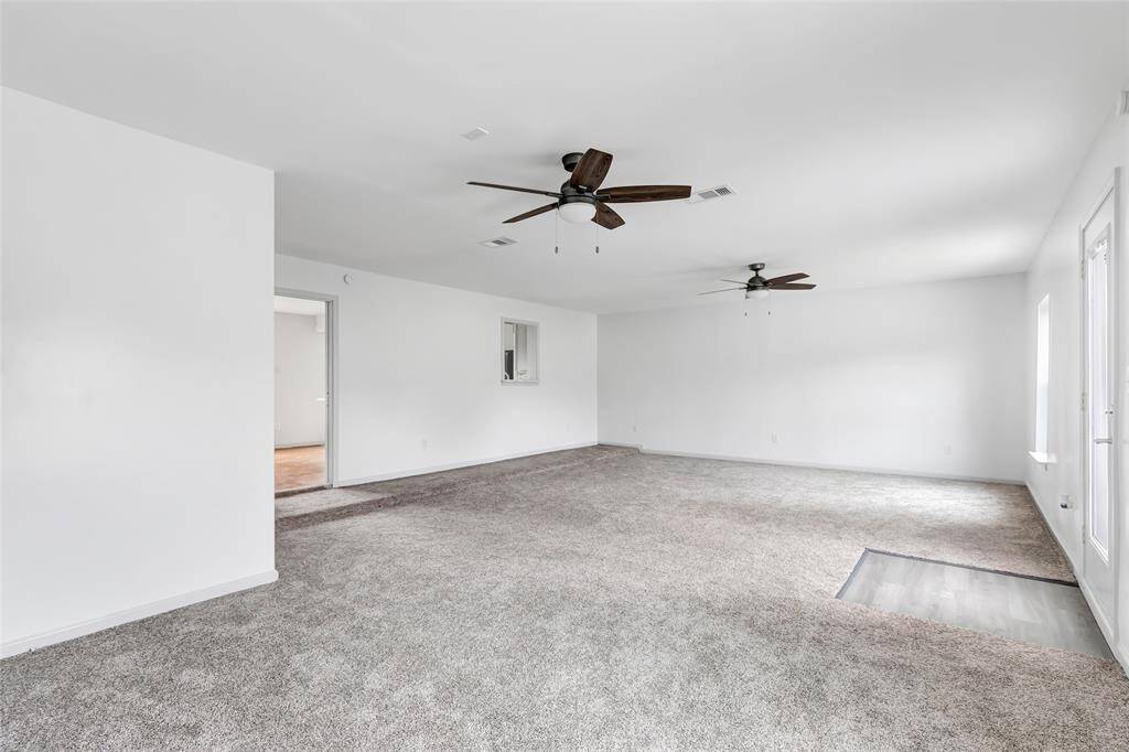 Natural light floods the family room