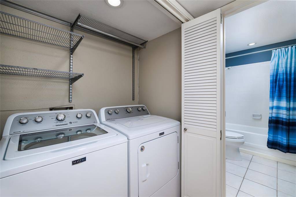 The washer and dryer stay in this unit.