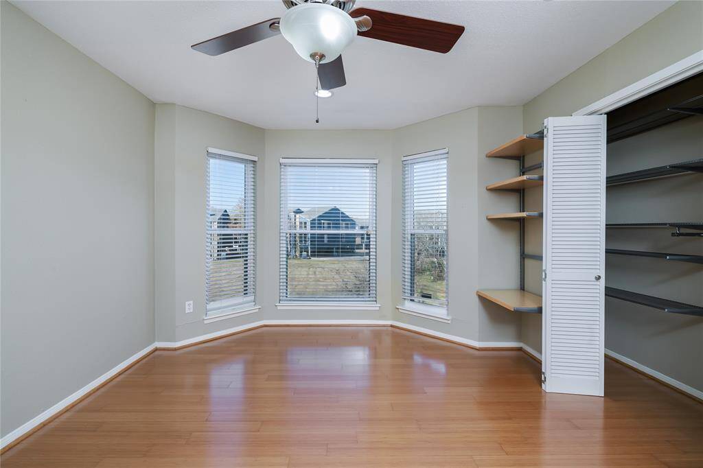 Bedroom number two with lots of windows/natural light.